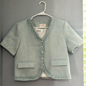 Two piece jacket and skirt.  Woven basket weave